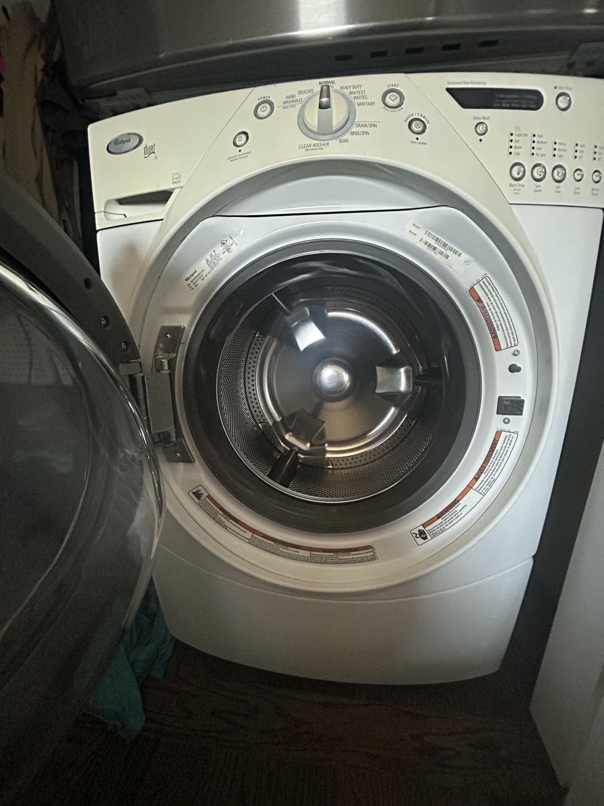 Front-load washer with the door open showing the drum — washer repair call in Kingston, WA