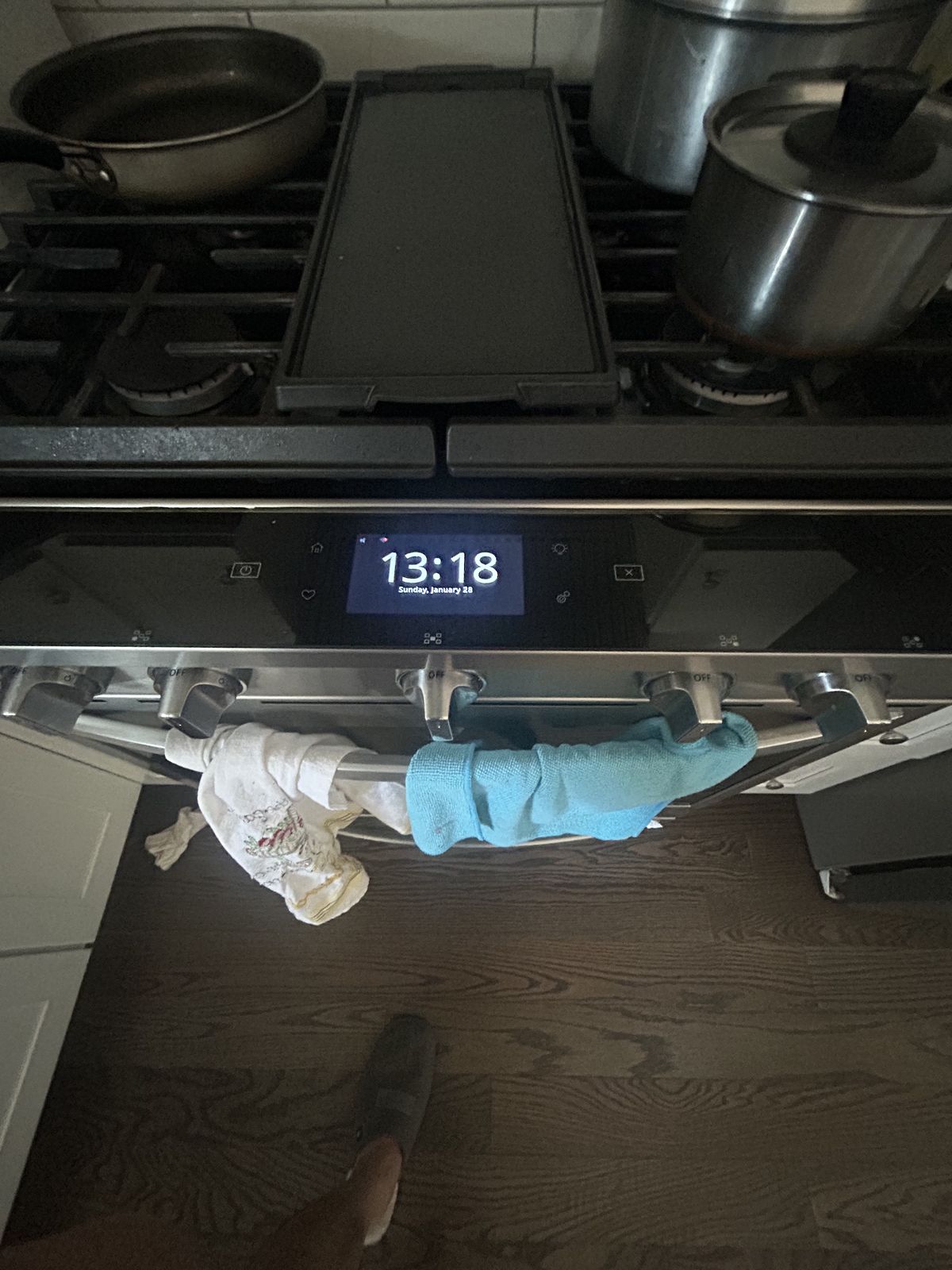 Touchscreen control panel on a stainless gas range — oven and range repair call in Gig Harbor, WA